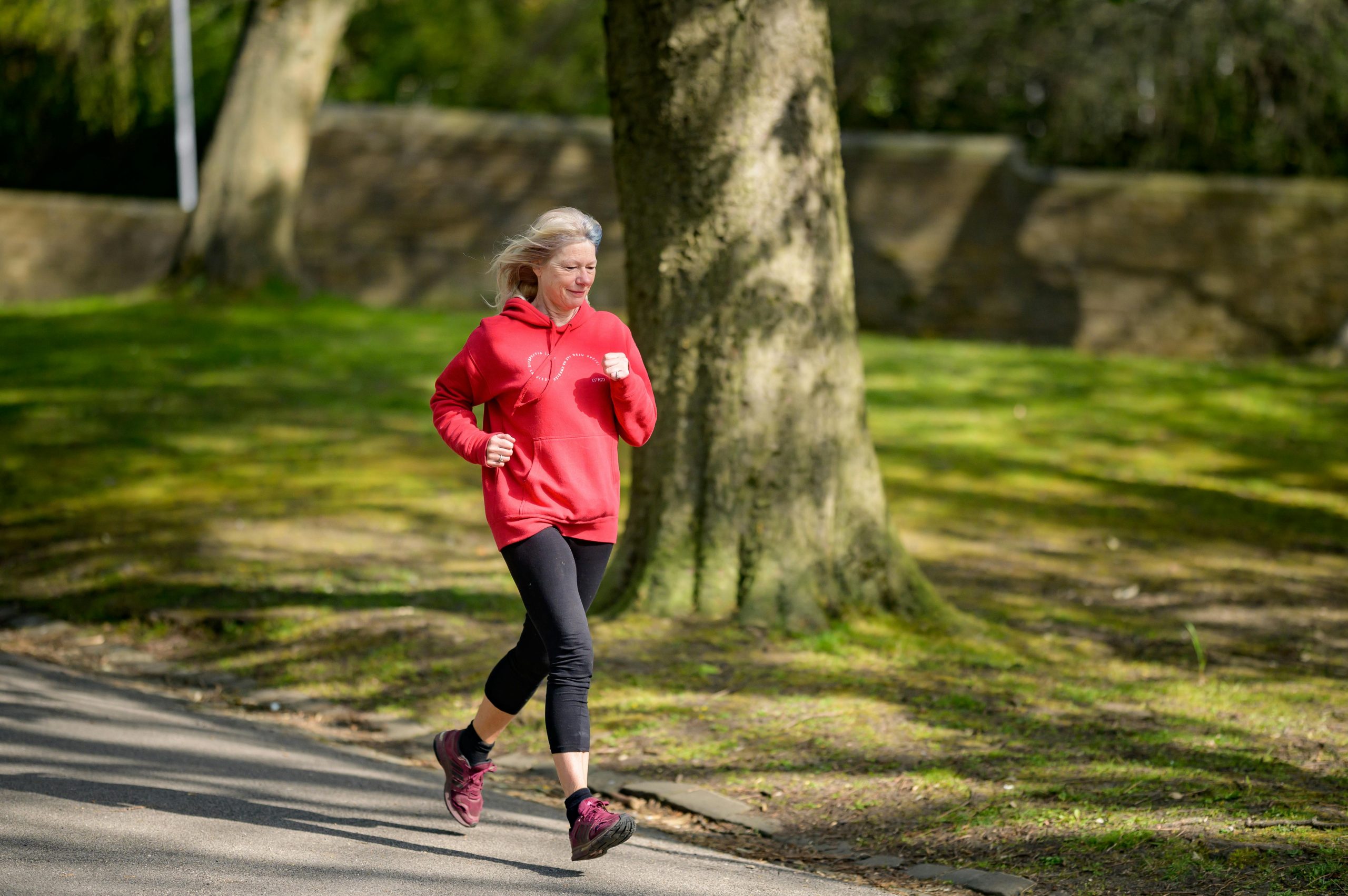 Resilient Health and Fitness Older Lady Running